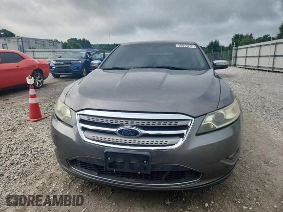 2011 Ford Taurus Limited z VIN 1FAHP2JW1BG156691, wystawiony jako Copart lot #59811755 z przebiegiem 162 828 mil mil oraz Szkoda całkowita • Salvage title. Historia ofert i sprzedaży dostępna na DreamBid. Obrazek 5.