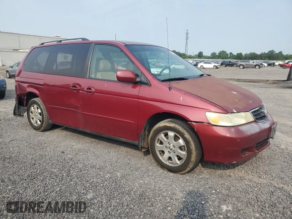 2004 Honda Odyssey EX-L with VIN 5FNRL18024B008617, listed as a Copart auction lot 58831435 with Not provided miles and Salvage title. Bid and sale history available at DreamBid. Image 4.