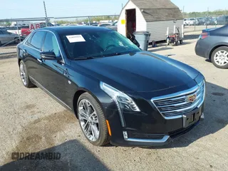 2018 Cadillac CT6 Sport AWD z VIN 1G6KP5R60JU121388, wystawiony jako IAAI lot #42099911 z przebiegiem 75 593 mil mil oraz . Historia ofert i sprzedaży dostępna na DreamBid. Obrazek 1.
