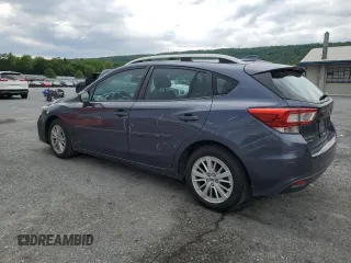 2017 Subaru Impreza Premium with VIN 4S3GTAD61H3711128, listed as a Copart auction lot 58942425 with 127,890 mi miles and Salvage title. Bid and sale history available at DreamBid. Image 2.