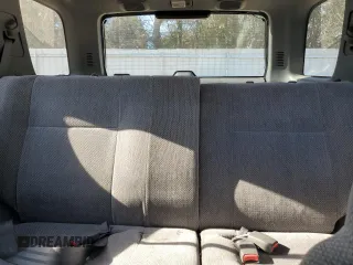 1999 Isuzu Rodeo S with VIN 4S2CK58W7X4357910, listed as a Copart auction lot 86955254 with 105,593 mi miles and Salvage Title. Bid and sale history available at DreamBid. Image 10.