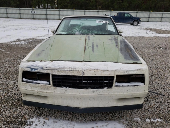 1985 Chevrolet Monte Carlo Sport SS with VIN 1G1GZ37G3FR191080, listed as a Copart auction lot 88876755 with 27,791 mi miles and Salvage Title. Bid and sale history available at carsss.com. Image 5.