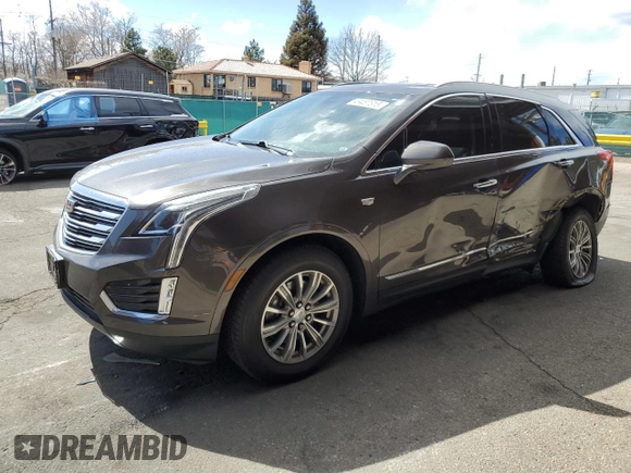 2019 Cadillac XT5 Luxury AWD with VIN 1GYKNDRS0KZ229941, listed as a Copart auction lot 49457315 with 48,856 mi miles and Salvage Title. Bid and sale history available at carsss.com. Image 1.