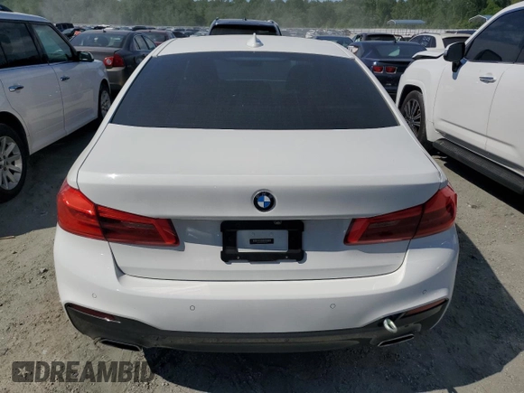 2018 BMW 5 Series 540i xDrive with VIN WBAJE7C52JG891212, listed as a Copart auction lot 58119195 with 73,770 mi miles and Salvage title. Bid and sale history available at DreamBid. Image 6.
