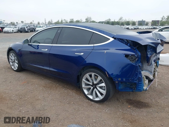 2020 Tesla Model 3 Standard Range Plus with VIN 5YJ3E1EA1LF802648, listed as a IAAI auction lot 42208034 with 27,231 mi miles and . Bid and sale history available at DreamBid. Image 3.