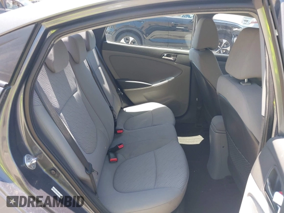 2013 Hyundai Accent GLS z VIN KMHCU4AE9DU427450, wystawiony jako IAAI lot #42415750 z przebiegiem 105 890 mil mil oraz . Historia ofert i sprzedaży dostępna na DreamBid. Obrazek 8.