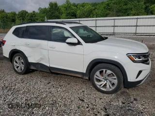 2023 Volkswagen Atlas SE with VIN 1V2KR2CA2PC524739, listed as a Copart auction lot 56976715 with 58,736 mi miles and Salvage title. Bid and sale history available at DreamBid. Image 4.