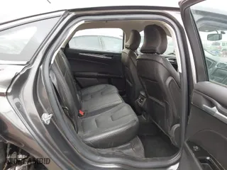 2016 Ford Fusion Titanium with VIN 3FA6P0K92GR135630, listed as a IAAI auction lot 41725598 with 58,936 mi miles. Bid and sale history available at carsss.com. Image 8.