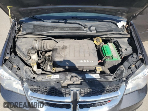 2017 Dodge Grand Caravan SE Plus with VIN 2C4RDGBG3HR597578, listed as a Copart auction lot 54502855 with 103,312 mi miles and Clean Title. Bid and sale history available at DreamBid. Image 12.