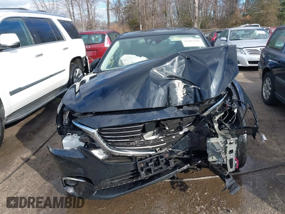 2016 Mazda 6 i Grand Touring with VIN JM1GJ1W54G1454115, listed as a IAAI auction lot 41203298 with 104,632 mi miles and . Bid and sale history available at DreamBid. Image 13.