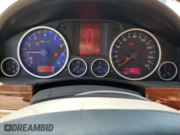 2010 Volkswagen Touareg VR6 with VIN WVGBF7A97AD003738, listed as a Copart auction lot 50394915 with 126,591 mi miles and Salvage Title. Bid and sale history available at DreamBid. Image 9.
