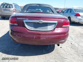 2002 Chrysler Sebring Conv with VIN 1C3EL45R12N279240, listed as a IAAI auction lot 41886541 with 65,576 mi miles. Bid and sale history available at carsss.com. Image 16.