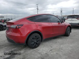 2024 Tesla Model Y Long Range с VIN 7SAYGDEE5RA251895, выставлен на аукционе Copart как лот 50180245 с пробегом 14 199 миль миль и Списание • Salvage title. История ставок и продаж доступна на DreamBid. Изображение 3.