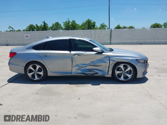2019 Honda Accord Touring z VIN 1HGCV2F99KA002506, wystawiony jako IAAI lot #42233936 z przebiegiem 88 612 mil mil oraz . Historia ofert i sprzedaży dostępna na DreamBid. Obrazek 13.