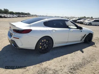 2023 BMW 8 Series M850i with VIN WBAGV8C0XPCK39846, listed as a Copart auction lot 61173594 with 0 mi miles and Salvage Title. Bid and sale history available at carsss.com. Image 3.