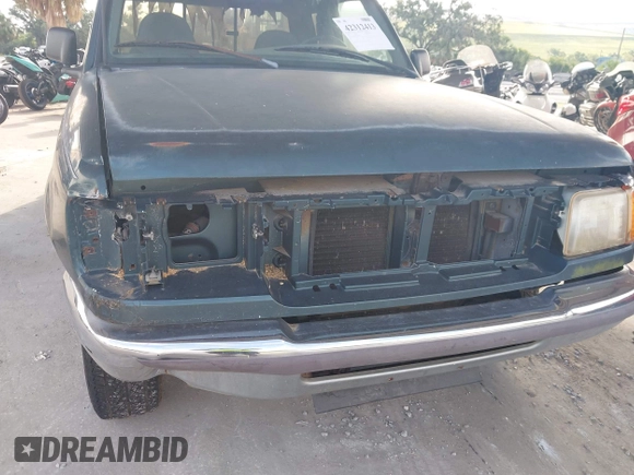 1996 Ford Ranger XL z VIN 1FTCR14AXTTA10663, wystawiony jako IAAI lot #42312413 z przebiegiem 104 211 mil mil oraz . Historia ofert i sprzedaży dostępna na DreamBid. Obrazek 6.