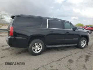 2018 Chevrolet Suburban LS with VIN 1GNSCGKC6JR303482, listed as a Copart auction lot 54703925 with 214,158 mi miles and Salvage title. Bid and sale history available at DreamBid. Image 3.