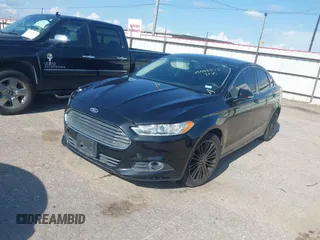 2014 Ford Fusion SE with VIN 3FA6P0HD4ER390773, listed as a IAAI auction lot 42088373 with 265,001 mi miles and . Bid and sale history available at DreamBid. Image 2.