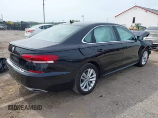 2020 Volkswagen Passat 2.0T SE with VIN 1VWWA7A30LC013193, listed as a IAAI auction lot 42127722 with 55,963 mi miles. Bid and sale history available at carsss.com. Image 4.