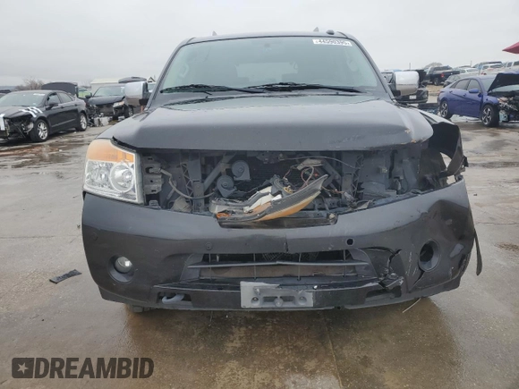 2014 Nissan Armada Platinum z VIN 5N1BA0NF5EN601168, wystawiony jako Copart lot #44590395 z przebiegiem Nie podano mil oraz Szkoda całkowita • Salvage title. Historia ofert i sprzedaży dostępna na DreamBid. Obrazek 5.