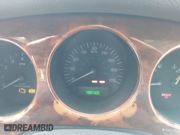 2003 Jaguar XJ with VIN SAJDA15B53MF53212, listed as a IAAI auction lot 41613266 with 180,165 mi miles and . Bid and sale history available at DreamBid. Image 7.