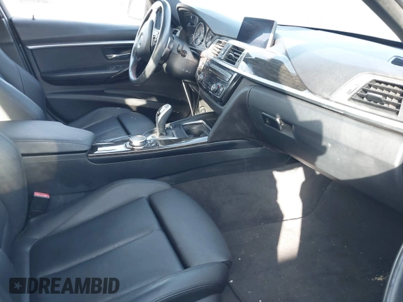 2016 BMW 3 Series 328i with VIN WBA8E9G56GNT82443, listed as a IAAI auction lot 41812424 with 56,965 mi miles. Bid and sale history available at carsss.com. Image 5.