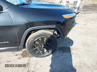 2016 Jeep Cherokee 75th Anniversary with VIN 1C4PJLCB5GW107918, listed as a IAAI auction lot 41923377 with 165,619 mi miles and . Bid and sale history available at DreamBid. Image 6.