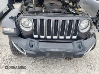 2020 Jeep Wrangler Unlimited Sahara with VIN 1C4HJXENXLW148140, listed as a Copart auction lot 43897435 with 104,411 mi miles and Salvage Title. Bid and sale history available at carsss.com. Image 12.