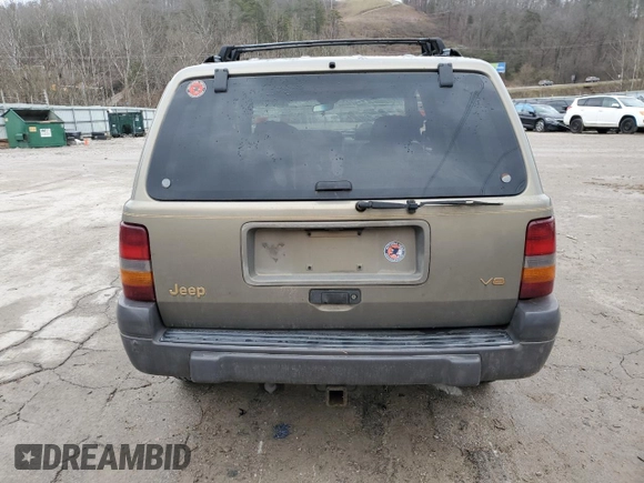 1996 Jeep Grand Cherokee Laredo with VIN 1J4GZ58Y5TC378100, listed as a Copart auction lot 85493724 with 0 mi miles and Salvage Title. Bid and sale history available at carsss.com. Image 6.
