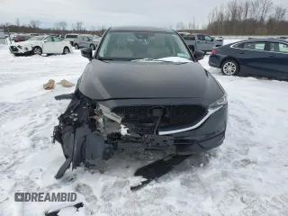 2019 Mazda CX-5 Touring with VIN JM3KFBCM0K0607933, listed as a Copart auction lot 46260815 with 64,349 mi miles and Salvage Title. Bid and sale history available at carsss.com. Image 5.