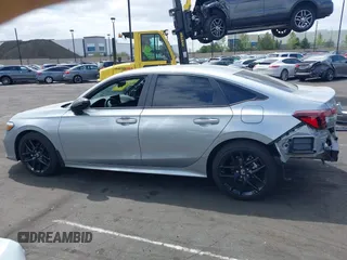 2025 Honda Civic Sport z VIN 2HGFE2F56SH555741, wystawiony jako IAAI lot #42121762 z przebiegiem 3 080 mil mil oraz . Historia ofert i sprzedaży dostępna na DreamBid. Obrazek 15.