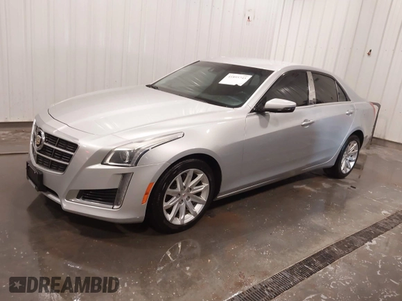 2014 Cadillac CTS Luxury AWD with VIN 1G6AX5SX3E0181029, listed as a IAAI auction lot 41895745 with 68,799 mi miles and . Bid and sale history available at DreamBid. Image 2.