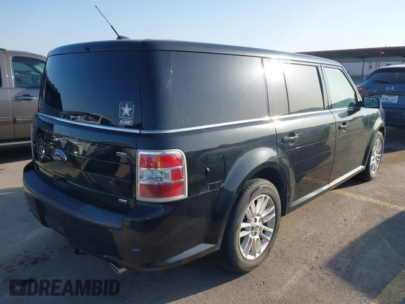 2013 Ford Flex SEL with VIN 2FMHK6C89DBD33136, listed as a IAAI auction lot 42019929 with 190,574 mi miles. Bid and sale history available at carsss.com. Image 4.