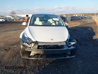 2024 Tesla Model Y с VIN 7SAYGDED5RF010087, выставлен на аукционе IAAI как лот 41312466 с пробегом Не указан миль и . История ставок и продаж доступна на DreamBid. Изображение 12.
