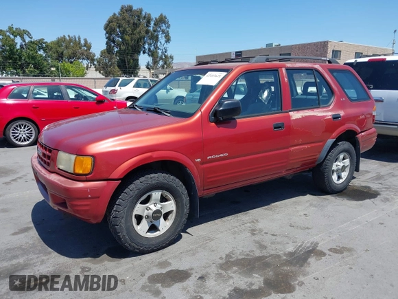 1999 Isuzu Rodeo S z VIN 4S2CK58W4X4362837, wystawiony jako IAAI lot #42403621 z przebiegiem 177 690 mil mil oraz . Historia ofert i sprzedaży dostępna na DreamBid. Obrazek 2.