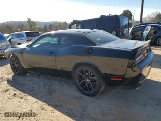 2023 Dodge Challenger R/T with VIN 2C3CDZBT0PH515247, listed as a Copart auction lot 45588055 with 35,452 mi miles and Salvage Title. Bid and sale history available at carsss.com. Image 2.