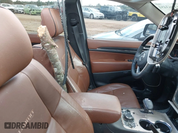 2015 Jeep Grand Cherokee Summit with VIN 1C4RJFJT1FC768707, listed as a IAAI auction lot 41863454 with 122,564 mi miles. Bid and sale history available at carsss.com. Image 5.