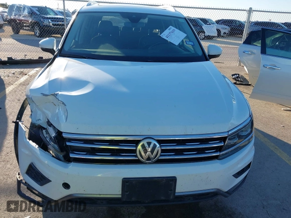 2018 Volkswagen Tiguan SEL Premium with VIN 3VV5B7AX2JM202908, listed as a IAAI auction lot 41137619 with 84,323 mi miles and . Bid and sale history available at DreamBid. Image 12.