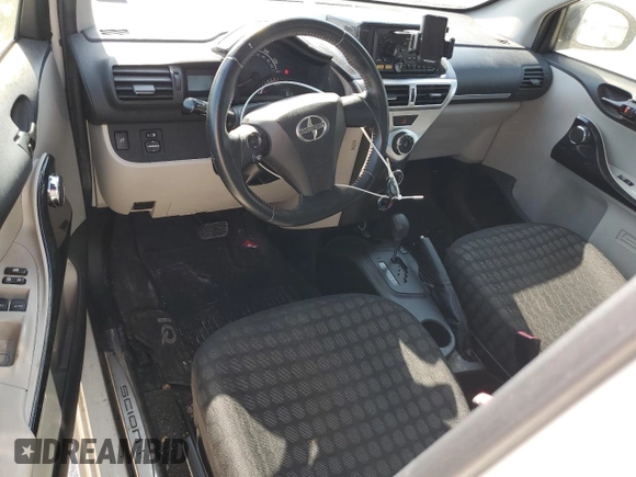 2012 Scion iQ with VIN JTNJJXB06CJ019475, listed as a Copart auction lot 61358615 with 94,194 mi miles and Clean title. Bid and sale history available at DreamBid. Image 8.