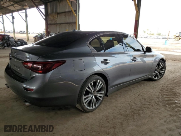 2018 Infiniti Q50 Luxe z VIN JN1EV7AR0JM444036, wystawiony jako Copart lot #49555055 z przebiegiem 76 319 mil mil oraz Czysty tytuł • Clean title. Historia ofert i sprzedaży dostępna na DreamBid. Obrazek 3.