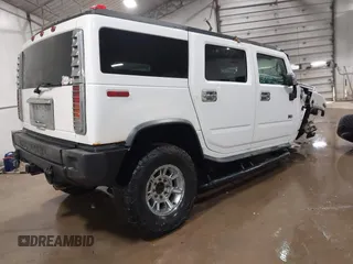 2004 Hummer H2 with VIN 5GRGN23U24H114260, listed as a IAAI auction lot 41346559 with 1 mi miles. Bid and sale history available at carsss.com. Image 4.