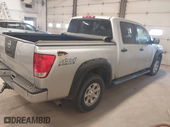 2005 Nissan Titan LE with VIN 1N6AA07BX5N507715, listed as a IAAI auction lot 41848566 with 254,548 mi miles. Bid and sale history available at carsss.com. Image 4.