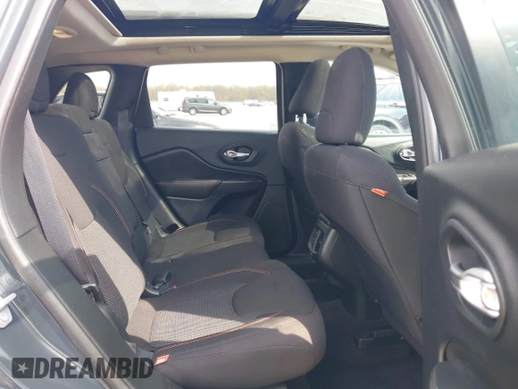 2016 Jeep Cherokee Latitude with VIN 1C4PJMCB2GW357736, listed as a IAAI auction lot 42017755 with 97,650 mi miles. Bid and sale history available at carsss.com. Image 8.