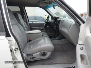 1999 Ford Explorer XLT z VIN 1FMZU32E1XZA80254, wystawiony jako IAAI lot #41453375 z przebiegiem 146 259 mil mil oraz . Historia ofert i sprzedaży dostępna na DreamBid. Obrazek 5.