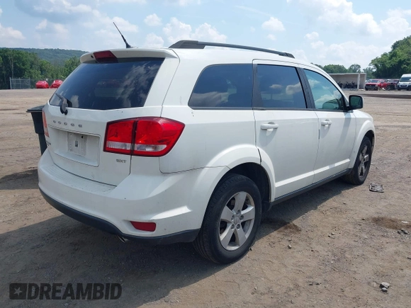 2012 Dodge Journey SXT with VIN 3C4PDDBG3CT307500, listed as a IAAI auction lot 42728446 with 122,072 mi miles and . Bid and sale history available at DreamBid. Image 4.