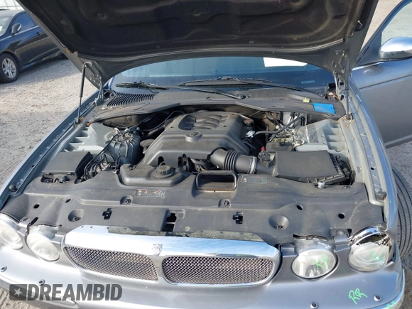 2007 Jaguar XJ Vanden Plas with VIN SAJWA82B27SH12131, listed as a IAAI auction lot 41910244 with 113,068 mi miles and . Bid and sale history available at DreamBid. Image 10.