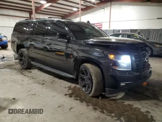 2019 Chevrolet Suburban Premier with VIN 1GNSKJKC7KR140553, listed as a Copart auction lot 83027274 with 89,835 mi miles and Salvage Title. Bid and sale history available at DreamBid. Image 4.