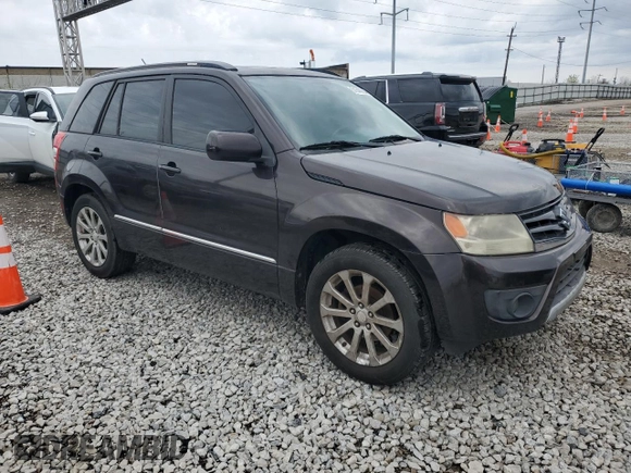 2013 Suzuki Grand Vitara z VIN JS3TE0D44D4100033, wystawiony jako Copart lot #51648665 z przebiegiem 151 879 mil mil oraz Czysty tytuł • Clean title. Historia ofert i sprzedaży dostępna na DreamBid. Obrazek 4.