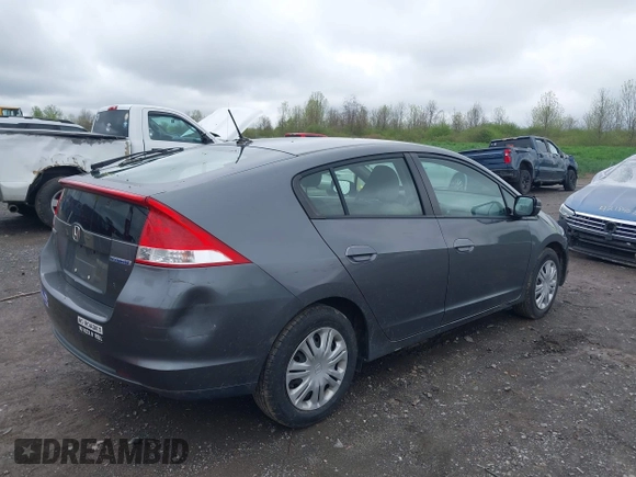 2010 Honda Insight LX with VIN JHMZE2H55AS041684, listed as a IAAI auction lot 42222564 with 296,830 mi miles and . Bid and sale history available at DreamBid. Image 4.