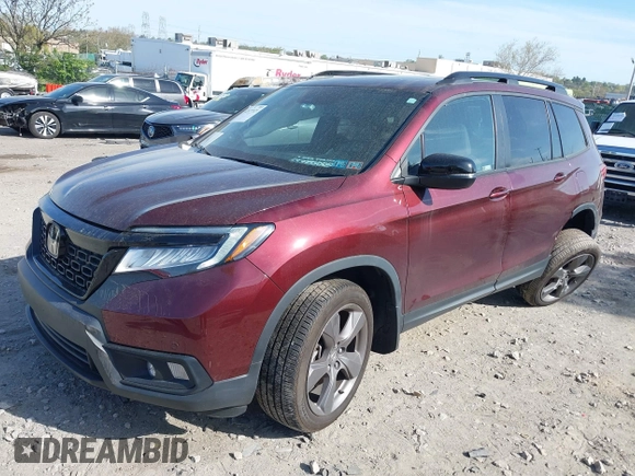 2021 Honda Passport Touring z VIN 5FNYF8H91MB022986, wystawiony jako IAAI lot #42077321 z przebiegiem 20 497 mil mil oraz . Historia ofert i sprzedaży dostępna na DreamBid. Obrazek 17.